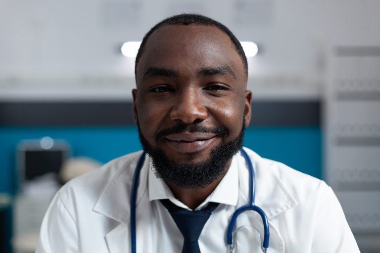 Closeup of african american specialist doctor with stethoscope