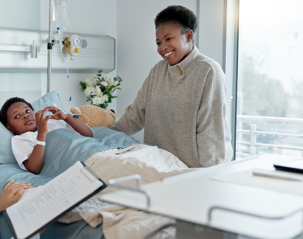 Mother, nurse and black kid patient in hospital for recovery of surgery for congenital heart diseas