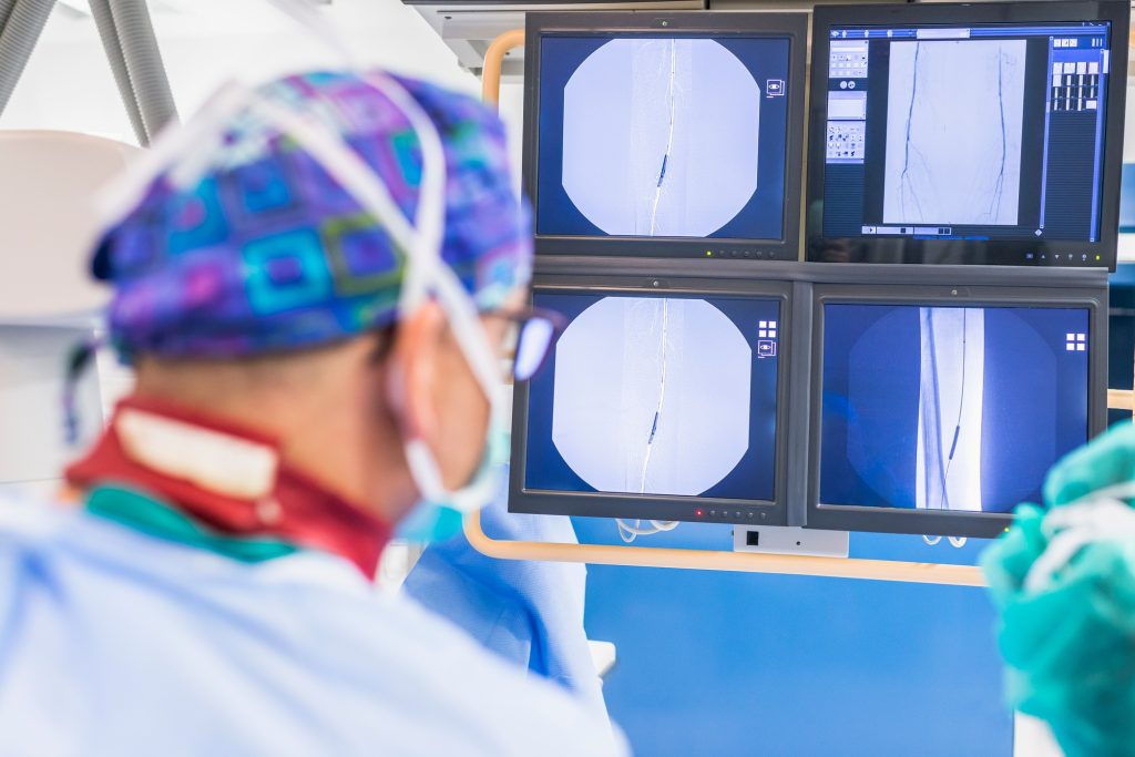Radiologist looking at x-ray image